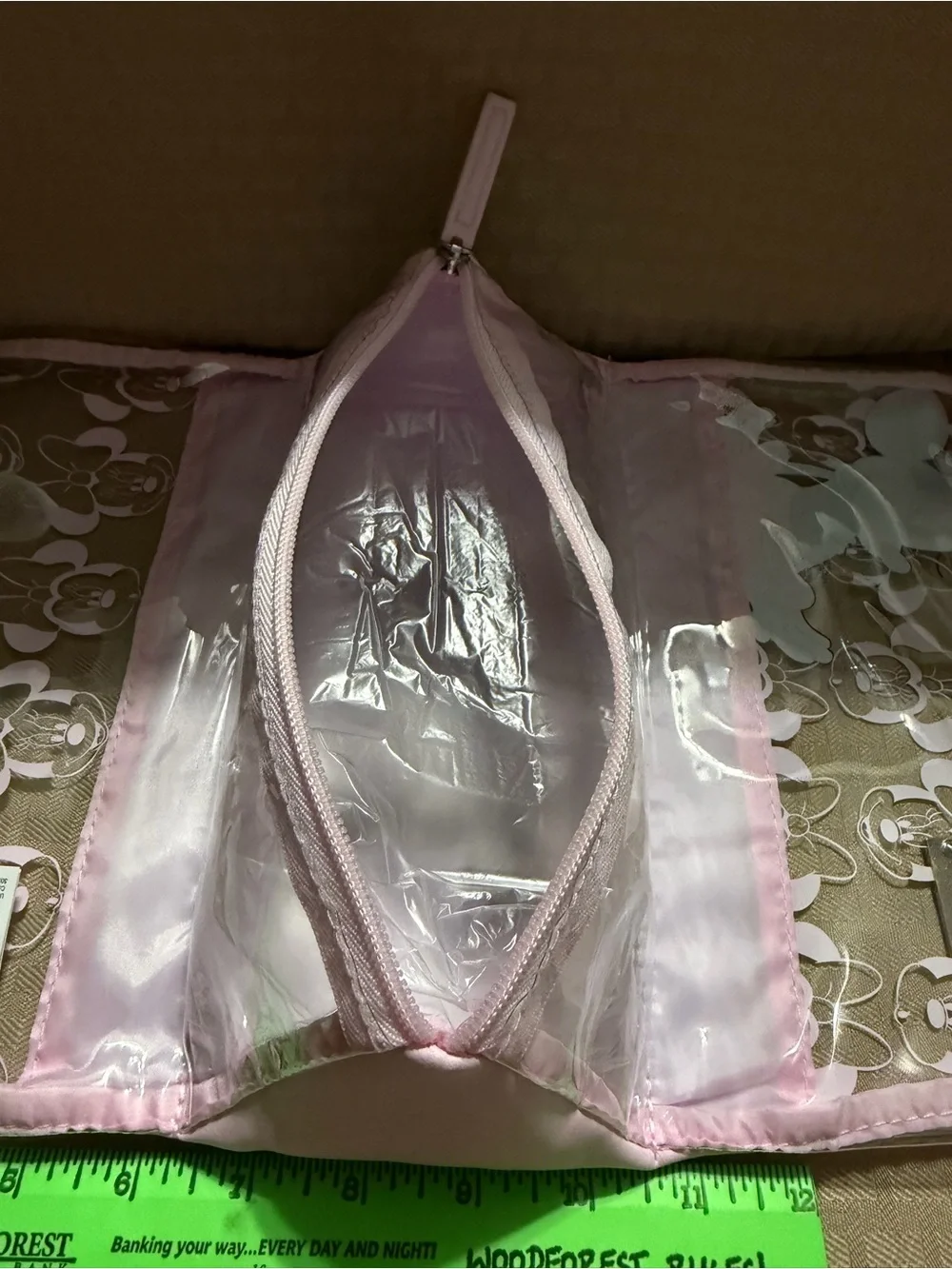 Minnie Mouse Pink Clear Cosmetic Bag “L” monogram on front.